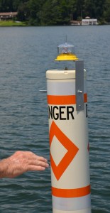 Please do not touch the new navigation lights on Lake Lanier. ~~ Photograph by Robert Sutherland