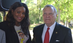 Kile Glover’s mother, Tameka Foster, & Governor Deal at the Signing of SB 136 in 2013. ~~ Photograph by Robert Sutherland 