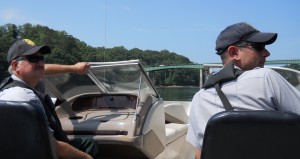 DNR Rangers wear safety vests as they patrol Lake Lanier. ~~  Photograph by Robert Sutherland